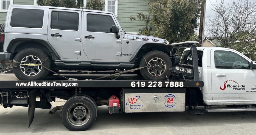Jeep on the All Roadside Towing Flatbed - Social Media Default