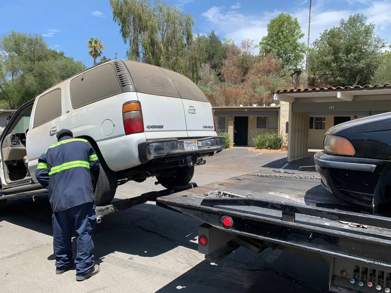 San Diego Towing is All Roadside Towing - Doubling 2 cars on a flatbed tow truck